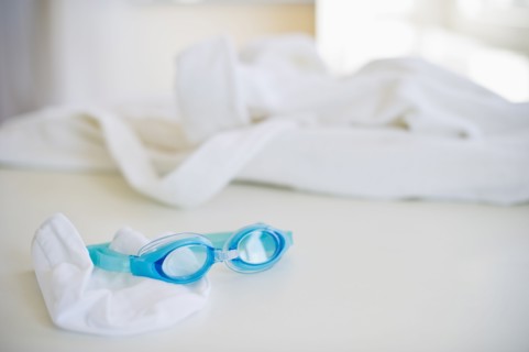 Swim cap and goggles.