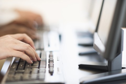 Employees working at computers.