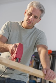 Handyman using an electric drill.