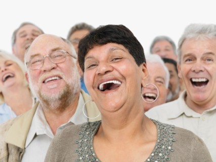 A group of laughing people. Photo : momentimages