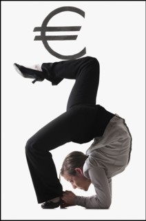 Euro symbol on top of contorted businesswoman. Photo : Mike Kemp