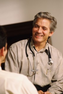 Doctor consulting with patient. Photo : Rob Lewine
