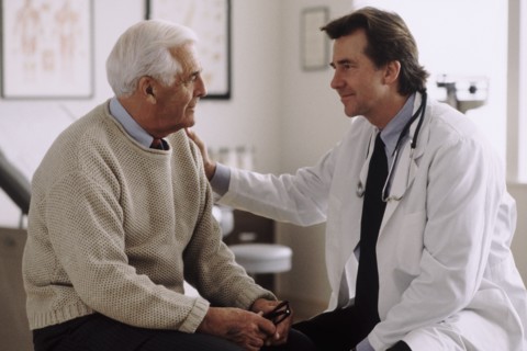 Doctor consulting with patient. Photo : Rob Lewine