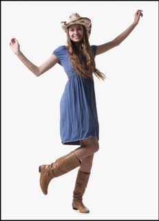 Smiling cowgirl. Photo : Mike Kemp