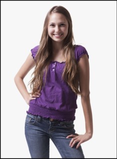 Portrait of a smiling teenage girl. Photo : Mike Kemp