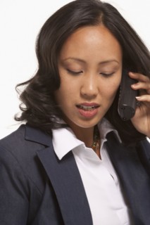 Businesswoman talking on phone. Photo : K.Hatt