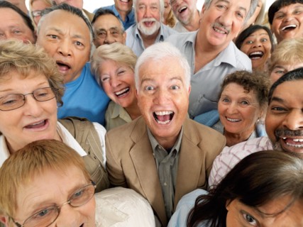 A group of laughing people. Photo : momentimages