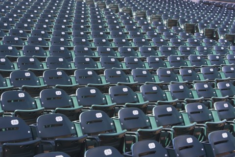 Empty bleacher seats. Photo : fotog