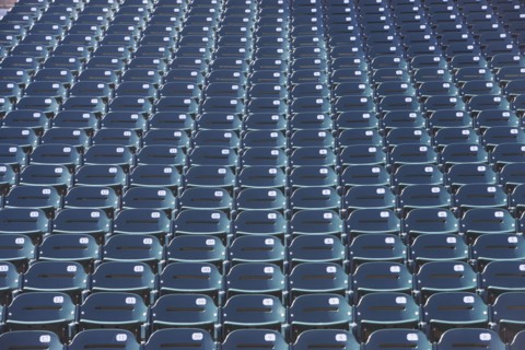 Empty bleacher seats. Photo : fotog