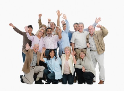 A group of people waving. Photo : momentimages