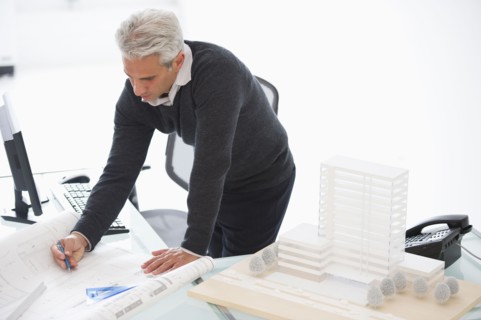 Architect working on house plans.