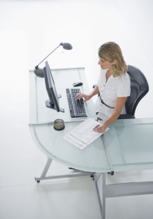Businesswoman working on laptop.