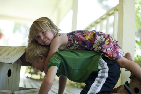 Brother and sister playing together. Photo : Tim Pannell