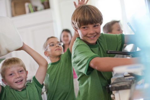 Group of children in kitchen. Photo : Tim Pannell