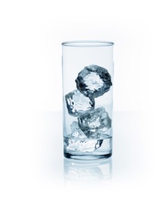 Ice cubes in glass. Photo. David Arky