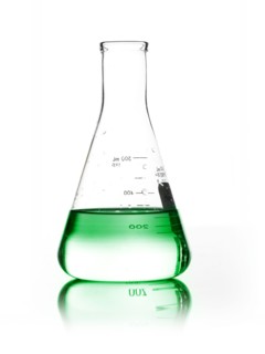 Green liquid in beaker. Photo : David Arky