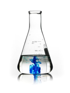 Blue liquid in beaker. Photo : David Arky