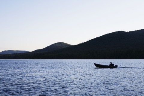 Motorboat on Lake Placid. Photo : Chris Hackett