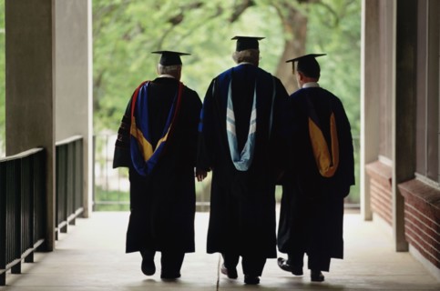Three adult graduates. Photo : Stewart Cohen