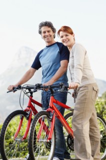 Smiling cyclists. Photo. momentimages