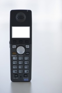 Illuminated screen on telephone. Photo : Daniel Grill