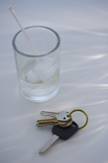 Keys beside alcoholic drink. Photo : Daniel Grill
