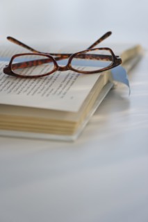 Reading glasses on book. Photo : Daniel Grill