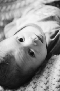 Baby lying down. Photo : Jamie Grill