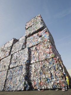 Stacks of crushed aluminum cans.