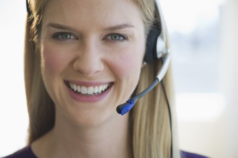Woman wearing headset.