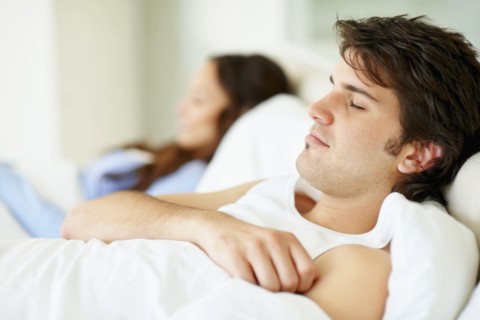 Couple sleeping. Photo. momentimages
