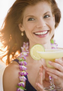 Woman drinking a frozen cocktail. Photo : Jamie Grill