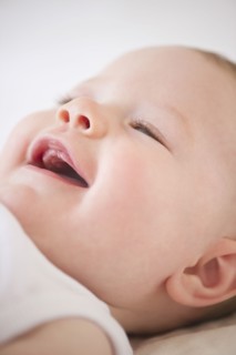 Smiling baby. Photo : Jamie Grill
