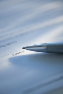Pen and signature line.