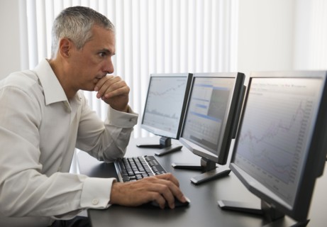 Businessman working at computer.