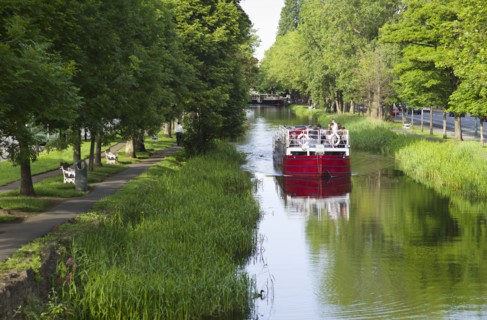River boat on Grand Canal in Dublin Ireland.