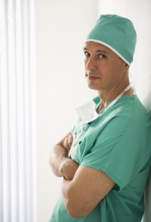 Surgeon wearing medical scrubs.