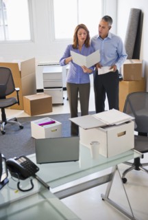 Business entrepreneurs working in startup office.