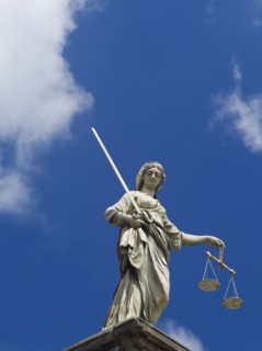 Scales of justice statue on the Dublin castle.