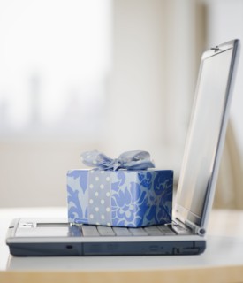 Gift on laptop. Photo : Jamie Grill
