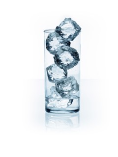Ice cubes in glass. Photo. David Arky