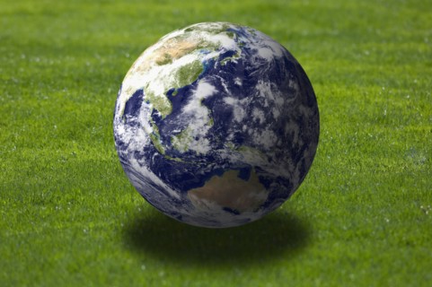 Earth over grass field