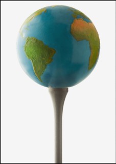 Globe on golf tee. Photo : Mike Kemp