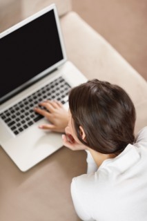 Woman browsing the internet. Photo. momentimages