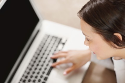 Woman browsing the internet. Photo. momentimages