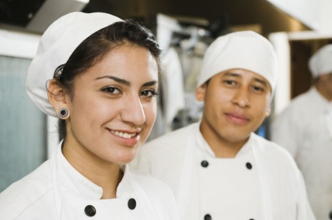 Chefs in bakery.