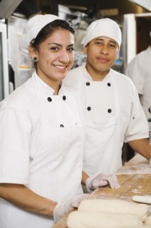 Chefs in bakery.