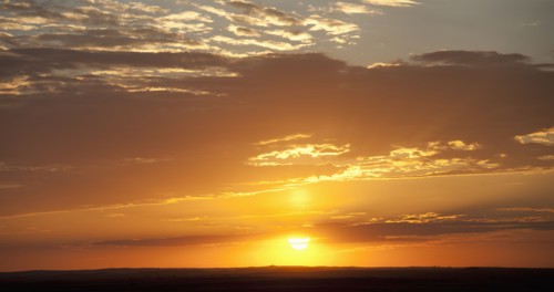 Sunset above prairie.
