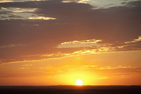 Sunset above prairie.