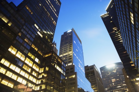USA, New York State, New York City, Low angle view of skyscrapers at twilight. Photo : fotog